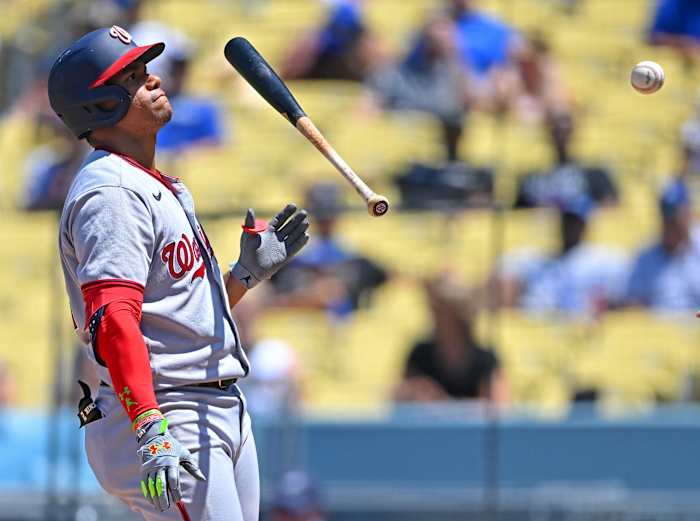 Juan Soto flips his bat.
